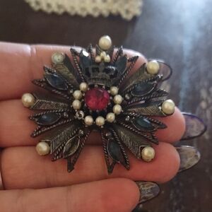 Ornate Floral Brooch with Red Center and Pearl Accents